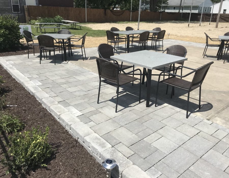 IMG_0809 Outdoor patio with tables and chairs.